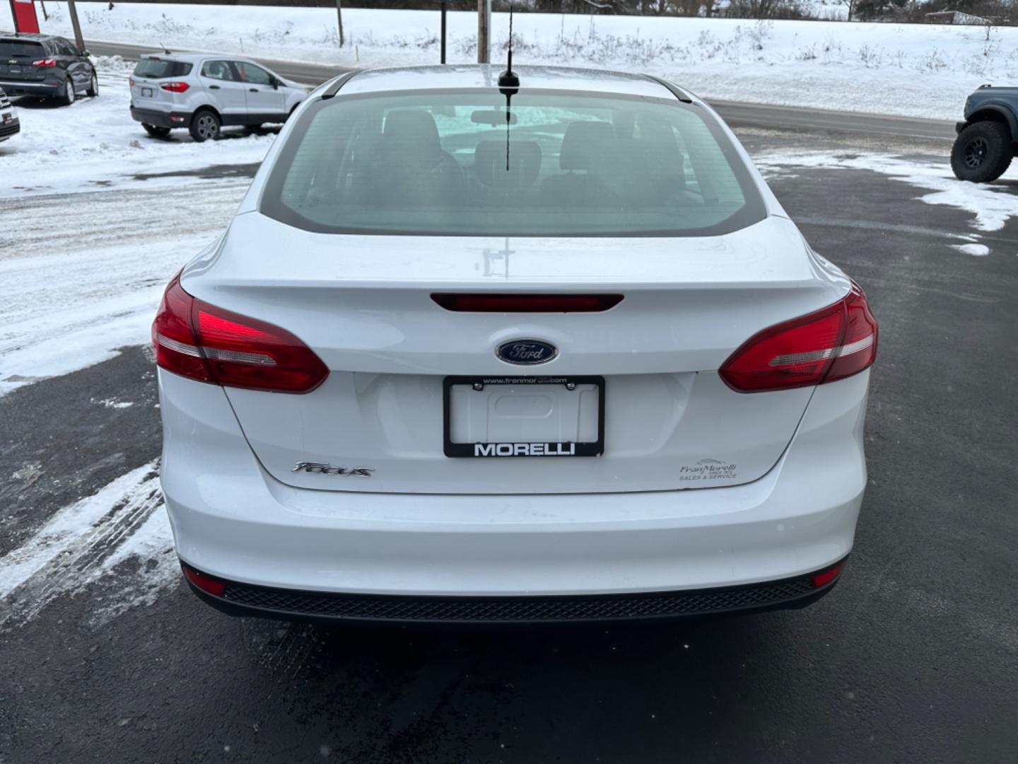 2018 White Ford Focus SE Sedan (1FADP3F20JL) with an 2.0L L4 DOHC 16V engine, Auto transmission, located at 8464 Route 219, Brockway, PA, 15824, (814) 265-1330, 41.226871, -78.780518 - Clean, well taken care of Ford Focus Se Sedan with 4 cylinder engine, air condition, power windows and locks, factory alloys and only 71000 miles. This pre owned car has been serviced, Pa-Inspected, and comes with warranty. Stop in or call one of the Morelli boys today to see this car which is pric - Photo#6